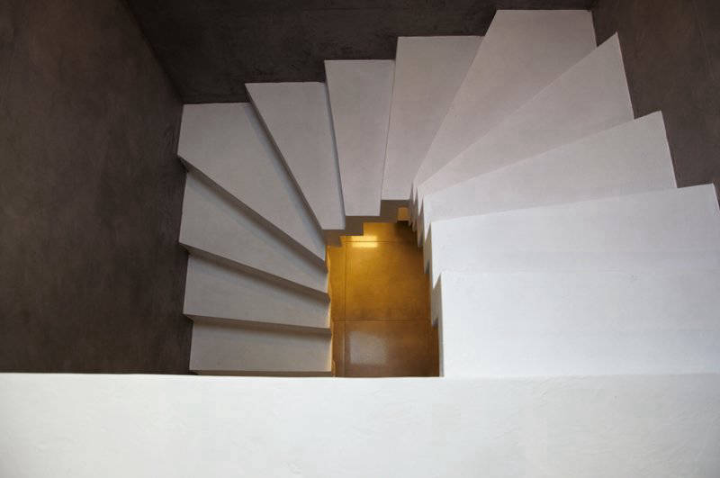 Modern staircase finished with white Cementare