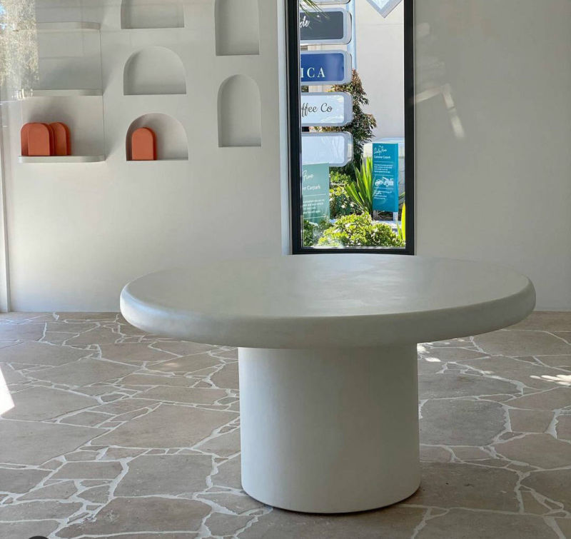 Decorative concrete table surface in Blanco