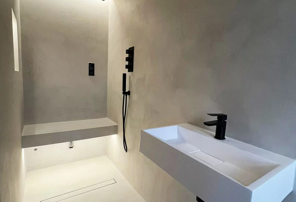 Bathroom basin and wall surfaces in Cafe
