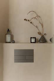 Decorative bathroom wall and niche surfaces in Cafe