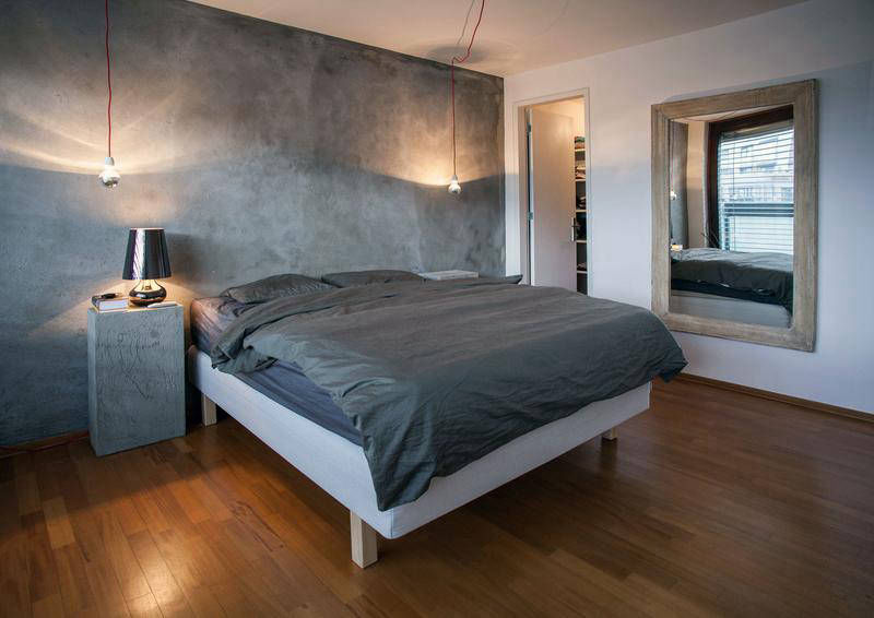 Concrete-look bedroom wall in Lune