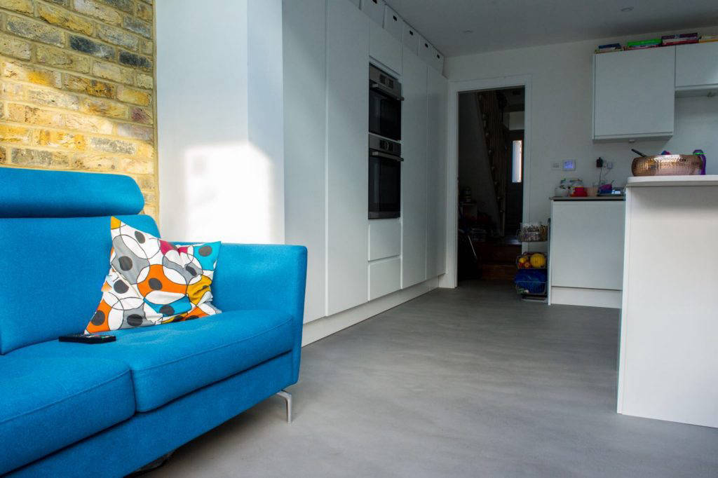 Contemporary living room with naturally toned flooring
