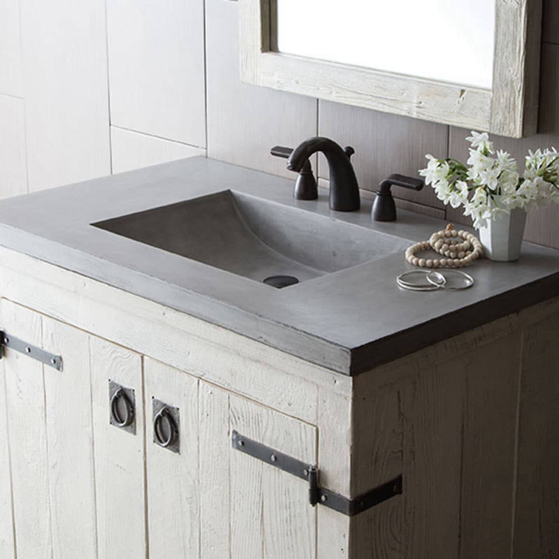 Dark grey integrated basin worktop on a timber cabinet