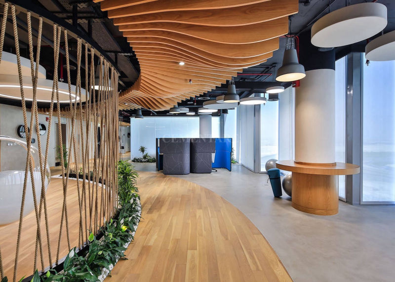 Grey office flooring with timber ceiling and floor details