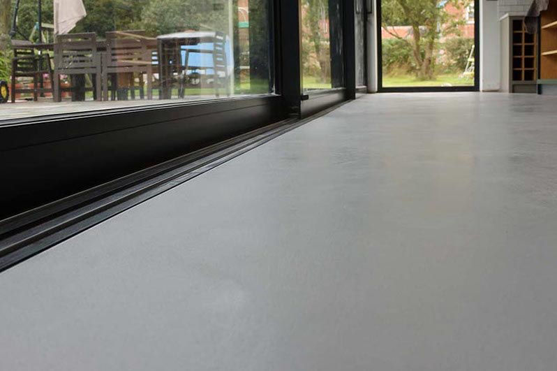 grey concrete-look floor surface